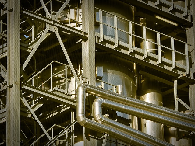 Industrial process structure with insulated piping and vessels